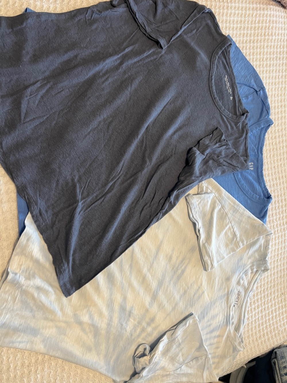 3 Blue Shirts